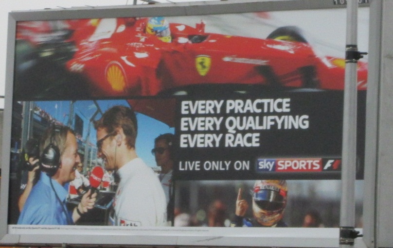 Sky Sports F1's billboard advertising in the run-up to the 2013 Formula One season. Top: Fernando Alonso; Bottom Left: Martin Brundle interviews Jenson Button in Australia 2012; Bottom Right: Sebastian Vettel.