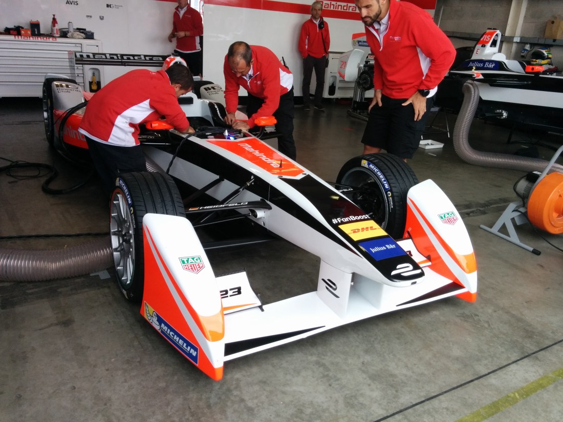 The Mahindra mechanics at work during day three of Formula E testing.